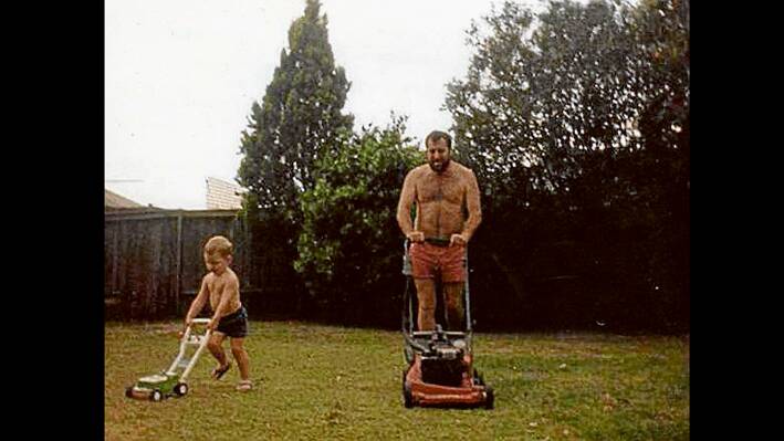 Picture of John Waugh and his son Josh (taken in the late 80’s) which won the Bundaberg Ginger Beer “Old School Dad’s” Competition. (Photo contributed) 