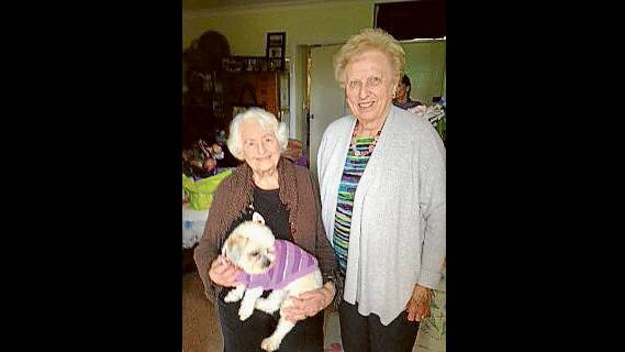 Elvine Elliott-Horsfall of Cowra holding her 100th birthday gift an adorable Maltese Shitzhu “Honey” with her long time friend Lorna Morgan.
 