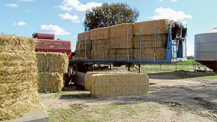 Our goal is to collect enough hay to fill two more road trains. 