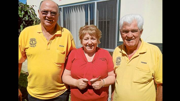 Lion Club President Barry Franklin with Grenfell Pre-School Director Sharon Grant and Lion Club Secretary Terry Carroll. 