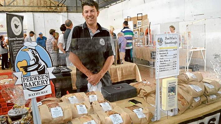 Darrin Whyms of Peewee's Bakery Bathurst at his Wild Yeast Sourdough stand at the Breakfast Table Twilight Markets. Darrin offers a wide variety of amazing sourdough's including White, Harvest, Kalamata Olive, Date Honey & Walnut, Olive Oil and Rosemary and more. These Sourdough's are available locally from Dog Gone Wild in Main Street Grenfell. 