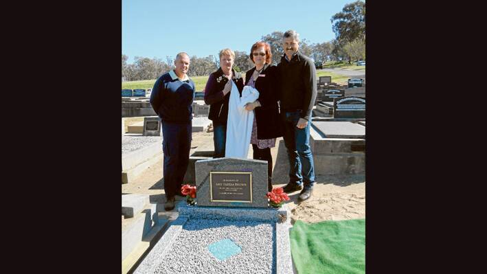 Craig Johnson, Kate Eppelstun and Karen and Don Blue of Penrose Funerals following the unveiling of Amy’s Colourful grave. 