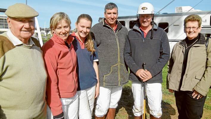 Clive Johnson with his daughter Dianne, granddaughter Sophie and son in law David McKillop, son in law Gary Stevenson (husband of Kaye) and Penelope Starr at the Polocrosse Carnival last Sunday morning.
The McKillop and Stevenson families competed on both days of the carnival.
 