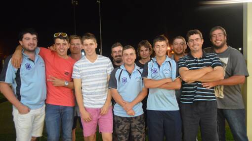 Grenfell A grade cricket side celebrating their defeat in the grand final against Cowra Bowling Club. 