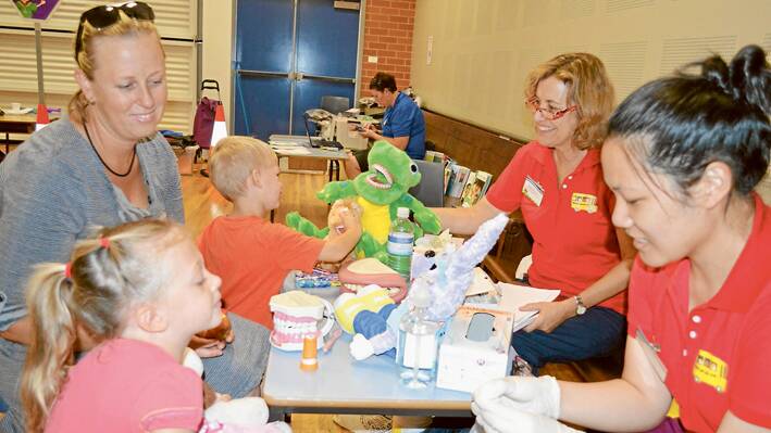 Pictured here are the dental nurses with local kids, the aim is to make the check ups fun for the children. Each child receives a backpack jammed full of fantastic goodies your child will love. 