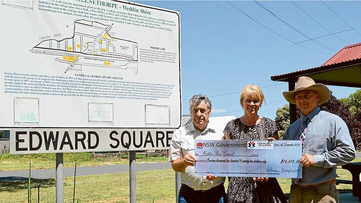 A NSW Government Grant was awarded to Weddin Shire Council for the amount of $14,472 for Greenethorpes' "Edward Square" to erect shade sails and new equipment. The Cheque was presented to Weddin Shire Mayor, Mark Liebich, last Tuesday, December 16, in Greenethorpe. Pictured here is Katrina, Mayor Liebich and Grenfell Record Editor Peter Soley. 