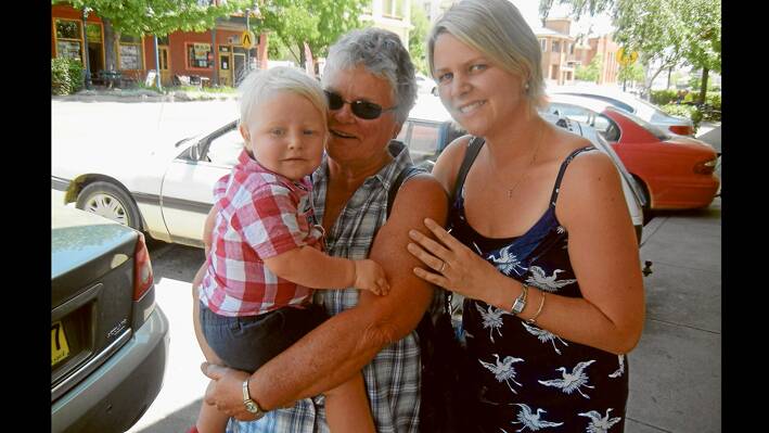 Virginia Drogemuller (L) holding her grandson Harrison and her daughter Paula Briggs enjoying some special time when they visited Grenfell from the Central Coast last weekend. 