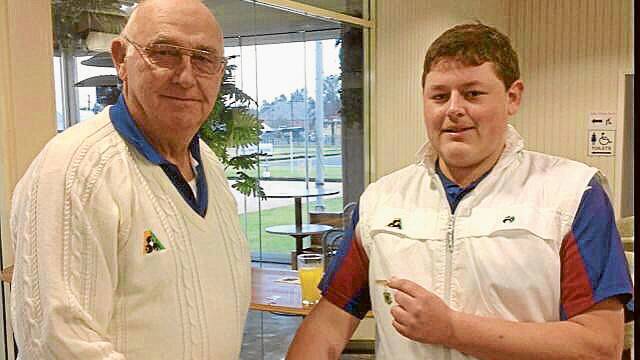 Blake Bradtke being congratulated by Keith Brus, President of the Grenfell Men’s Club after winning the 2014 Grenfell Bowling Club Singles Championship last week. (Photo contributed)
 