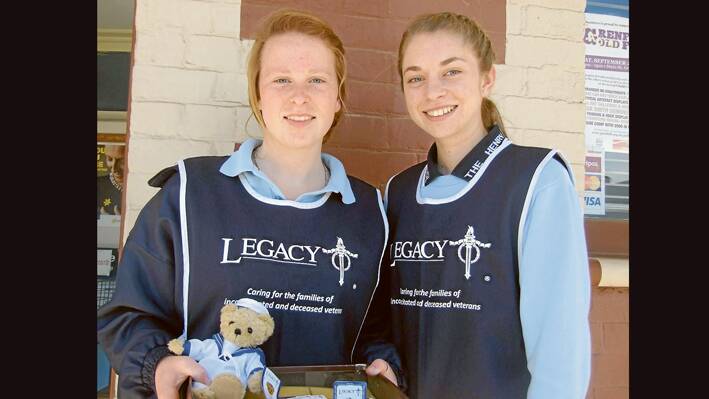 LEGACY GIRLS: Collecting money for Legacy by selling badges etc recently in town to local businesses were THLHS students Shannon Thompson-Jones and Annie Matthews.  