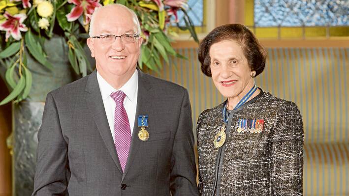 Peter Moffitt OAM receiving his award from Her Excellency Professor The Honourable Dame Marie Bashir AD CVO Governor of NSW. Photograph courtesy Rob Tuckwell Photography 