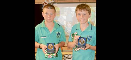 Heading off to High School are Jack Ray and Gage Durham, pictured here with the year 6 Medallions.