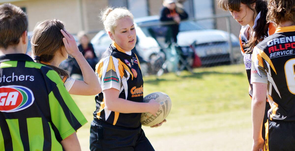 GIRLANNAS V CANOWINDRA: Kat Brenner running the ball in last Saturday’s League Tag game against Canowindra at Lawson Park.