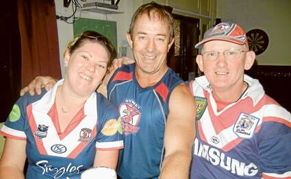 Happy Chooks - Freuin Forsyth, Al Leibich and Peter Keppie following their team’s win in the Rugby League Grand Final on Sunday evening.
