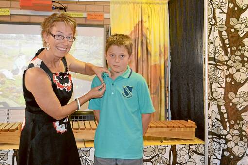 Juanita Meier, new principal for Caragabal Public School in 2014 Inducts the School Captain for 2014 Hamish Napier.