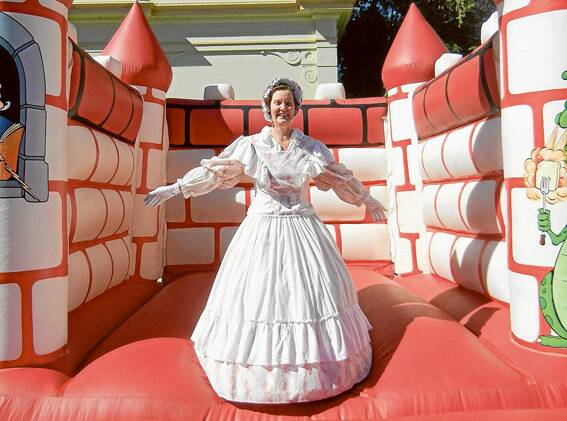 Wendy Richmond, a member of the Sydney Colonial Dancing group, enjoying the Lions’ Jumping Castle on Saturday morning at the Grenfell Gold Fest.