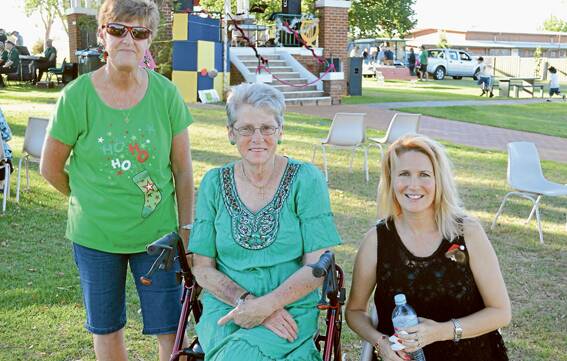 All with a smiley face at the Carols were (l/r) Carol Grant, Elaine Cawthorne and Linda Newton.