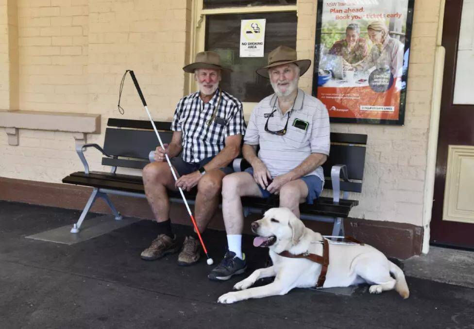 Colin Spicer, Doug Spicer and good boy Rusty Spicer. Picture by Carla Freedman
