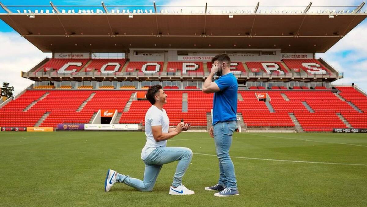 Adelaide United footballer Josh Cavallo proposes to his partner Leighton Morrell at Coopers Stadium. Picture via Instagram/@joshua.cavallo