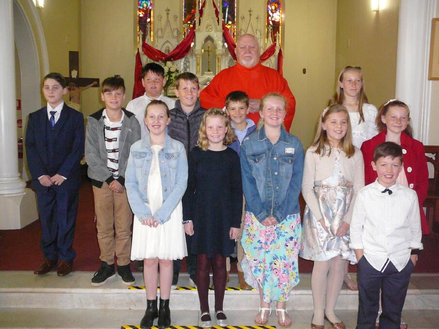 On Sunday morning August 4 children of St Joseph's Parish celebrated the Sacrament of First Holy Communion and Confirmation.