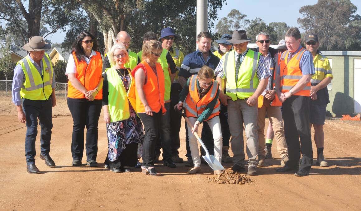 DIGGING DEEP: Member for Cootamundra Steph Cooke with Weddin Mayor Mark Liebich and fellow councillors and workers turning the first soil on the new grandstand.