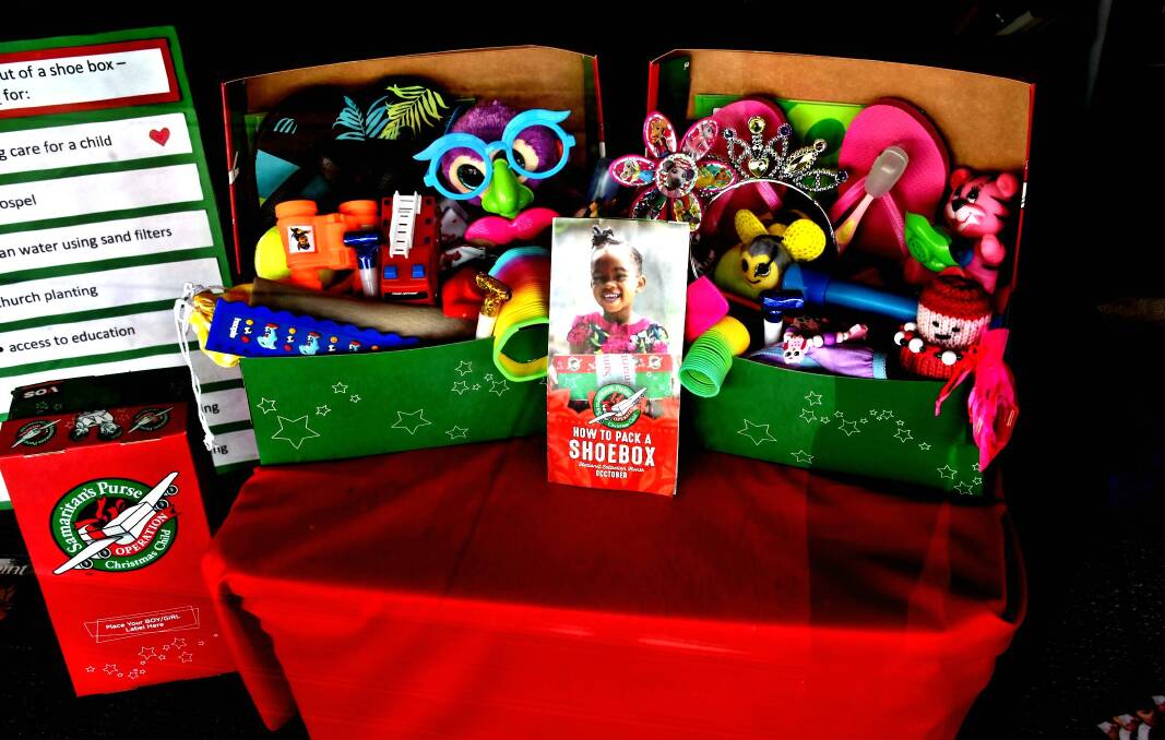 A BOX FULL OF FUN: Locals are packing boxes for Operation Christmas Child again this year. Photo: Rebecca Hewson.