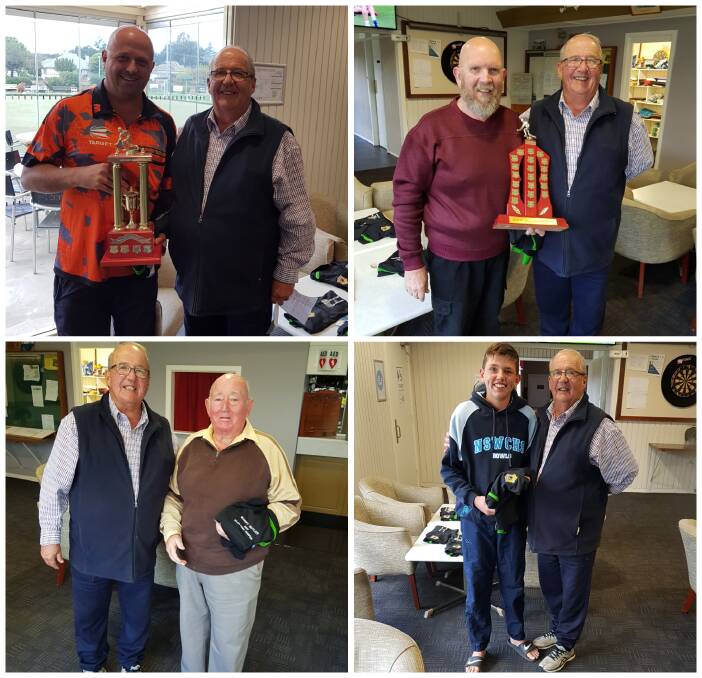 Players were presented with prizes after the singles championship was played recently.