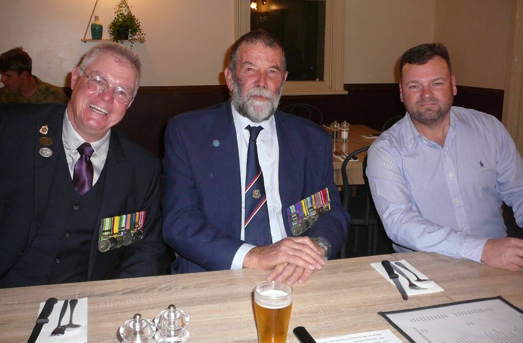 President of Grenfell RSL Sub-branch Glen Ivins with RSL members Keith Engelsman and Moe Reynolds at last year's commemorative dinner.
