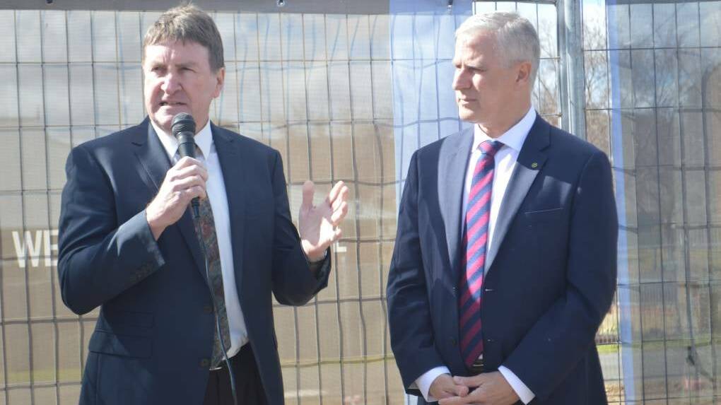 Glenn Carroll with Member for Riverina Michael McCormack at the site of the Grenfell Medical Centre. Photo: File.