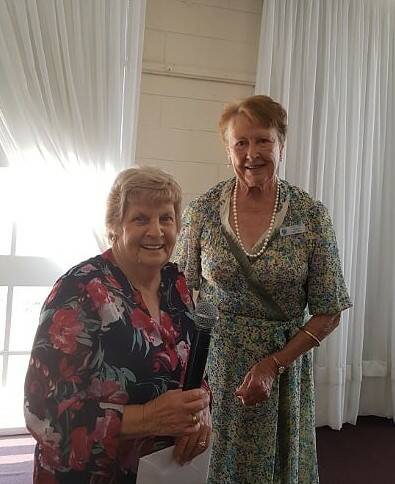 Coral Mitton, on behalf of Grenfell Probus Club, farewelled former Secretary Dot Fitzpatrick . Photo by Gwen Clark.