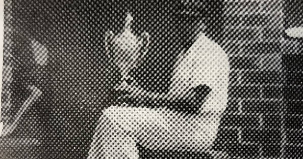 Grenfell 1947-48 captain Harry Anderson proudly displays the coveted Grinsted Cup. Photograph from The Grinsted Cup, A Cricket Tradition.