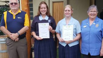Peter Bright and (right) Zone Chair Marie Tame from Young with public speaking winner Xanthe Johnson, overall winner Amelia Donnelly from Henry Lawson High School. Picture supplied
