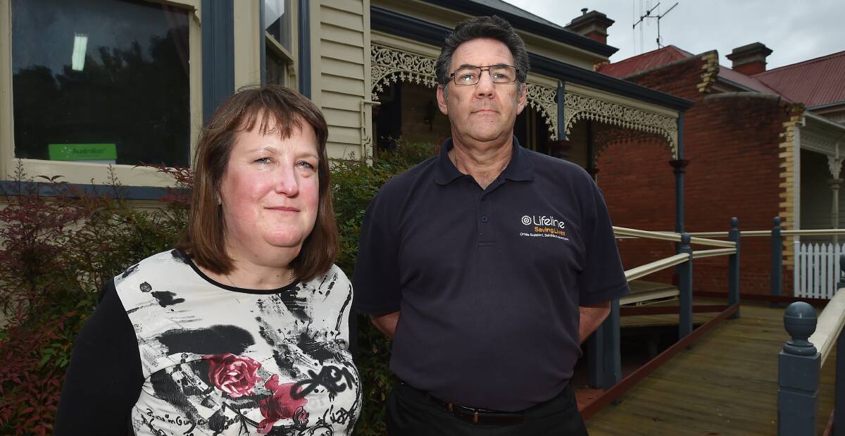 CALL FOR HELP: Lifeline Central Victoria and Mallee telephone crisis supporter Debbie and chief executive officer Leo Schultz. Picture: NONI HYETT