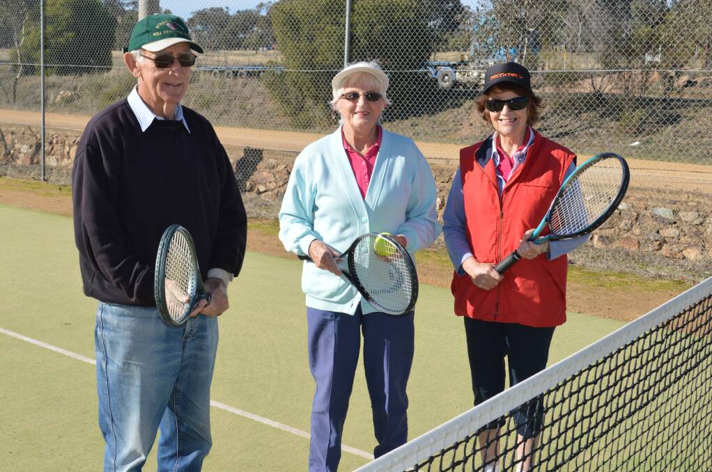 Graham Pattrick, Jenny Wells and Angela Ewing enjoyed a hit of social tennis yesterday at the Grenfell courts.