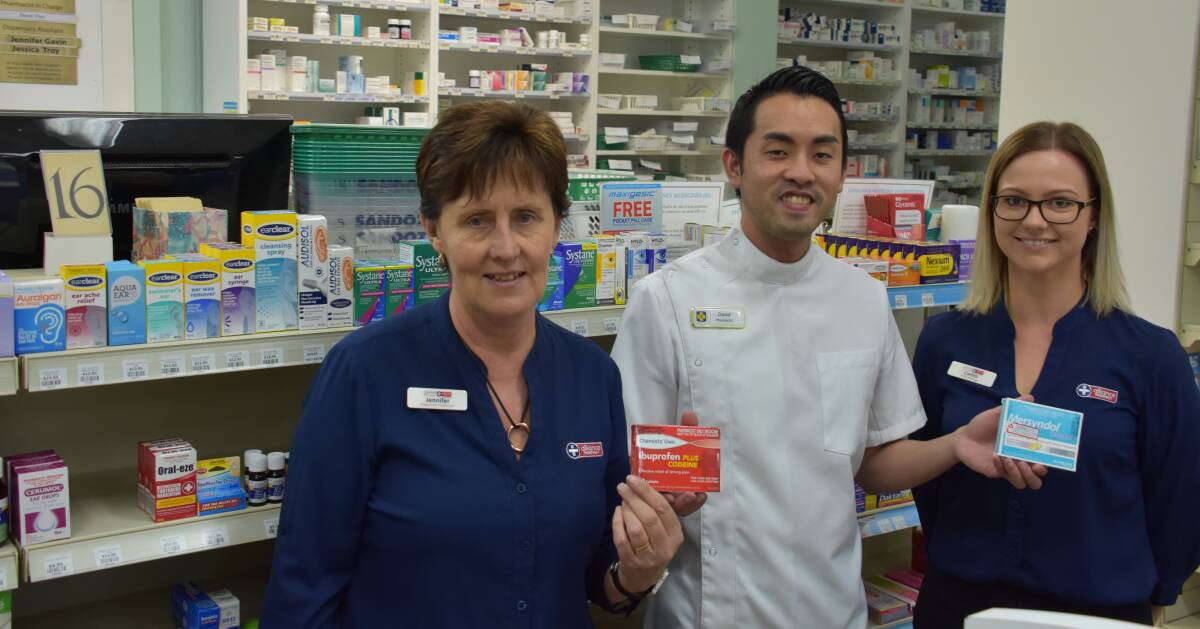 Off the shelf: Jenifer Gavin, pharmacist David Thiu and Caitlin McWay with products containing codeine at the Grenfell Pharmacy.