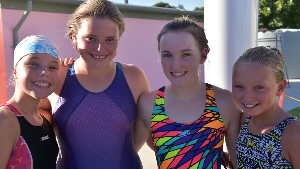 Amelia Squires, Niamh Mitton, Imogen Brenner and Mikayla Hughes at swimming club last Friday. A disco will be held tonight instead of swimming.