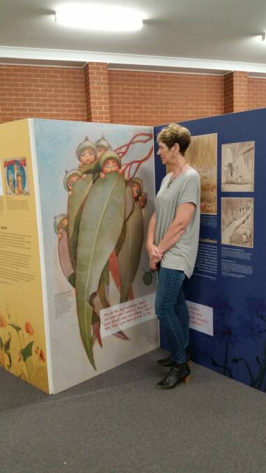 Raylene Slade from Hillston admiring the May Gibbs exhibition at the Grenfell Library.