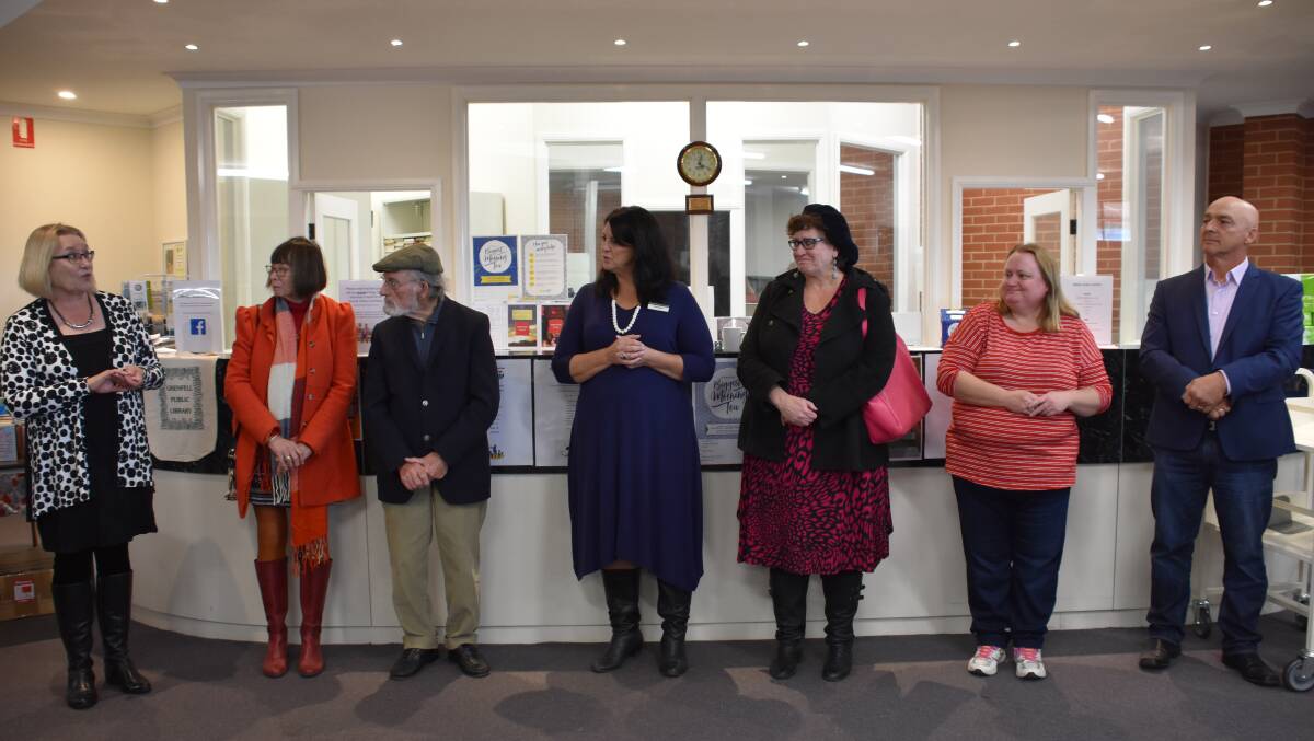Arts OutWest committee members with Blayney Artist Nyree Reynolds, Grenfell Librarian Erica Kearnes, second from right, and Weddin Shire Mayor Mark Liebich, far right.