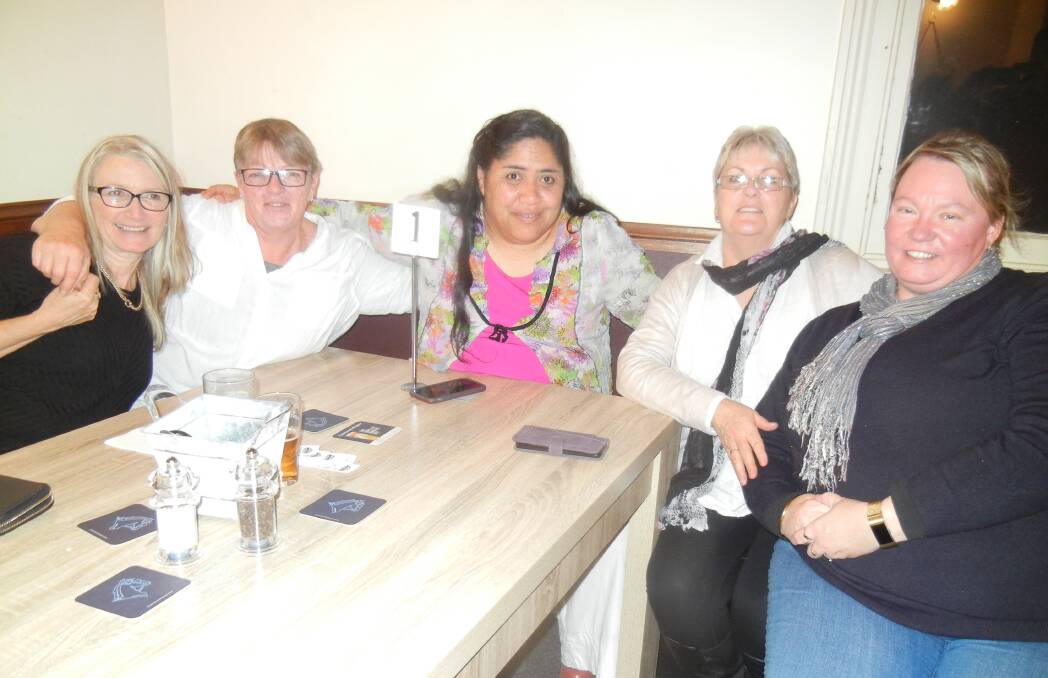 Wendy Bryant, Kathy Irons, Raewyn Apiiti, Dianne Yates and Rebecca Knight enjoying dinner at the Railway Hotel. 