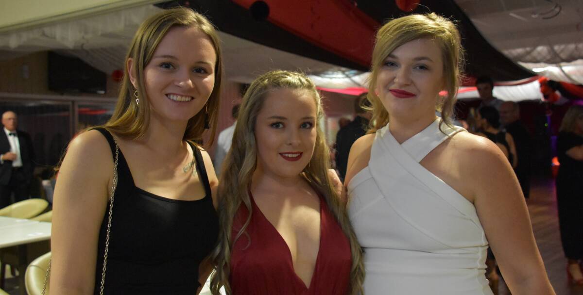 Sarah Knowles, Byanca Curl and Millie Scott at the Black, White and Red Ball.