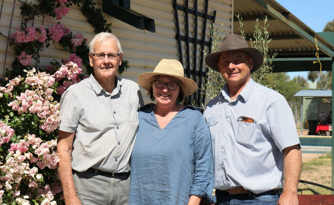 Bryson Troy, Jen Kelly and Weddin Shire mayor Mark Liebich in Bryson's beautiful rose garden. Image suppled