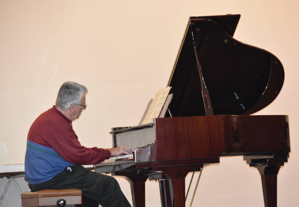 Grenfell's own talented pianist John Willems entertaining the crowd at the 2018 Seniors Week morning tea. 