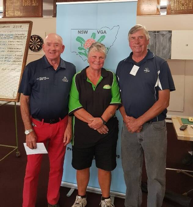 NSW Vets 36 Holes Scratch  runners-up are Allan Jones (L) and Virginia Drogemuller (M) of Grenfell. Photo Grenfell Country Club.