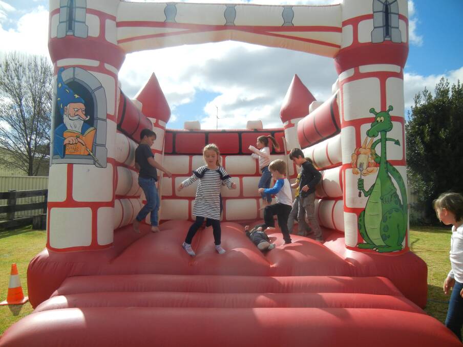  The littlies at Oliver McCann's birthday party enjoying the Lions jumping castle.