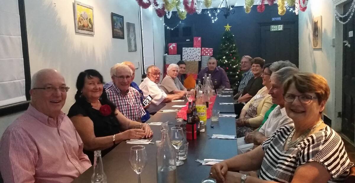 The Rotary Club of Grenfell enjoy their annual Christmas Party at Spice'N'Aroma cafe in Main Street. Image supplied  