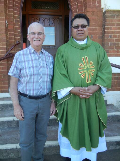 Fr Allen Crowe with Fr Paletasala when he was welcomed to Grenfell in January.