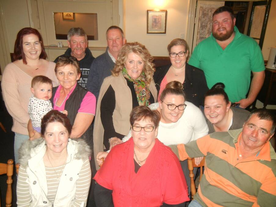 Vicki Carter with her family and friends at her birthday dinner. 