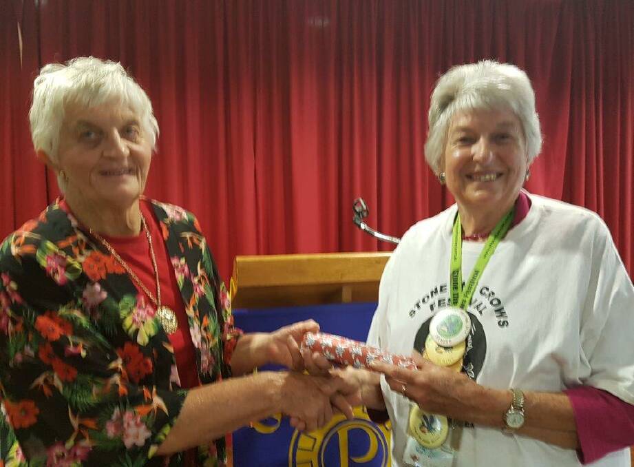Jenny Wells presents Elaine Pereira with a gift of appreciation. Photo Gwen Clark 
