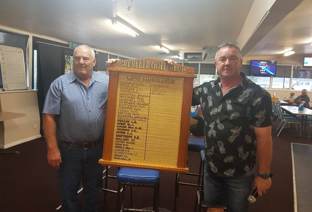 Steve Grace (L) is awarded Honarary Life Membership of the Grenfell Country Club, pictured with club president Mark Troith (R). Image supplied