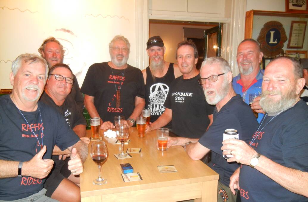 Bill Eyels (F-L) with participants in the Ironbark Ride enjoying a stopover at the Railway Hotel.