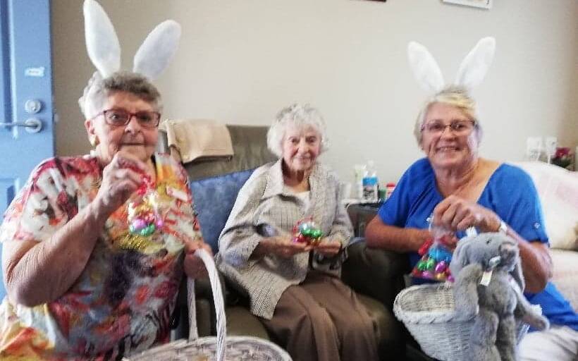 Easter Bunnies Glenice Clarke and Jan Holland deliver Easter Eggs to Betty Kelleher. (Cont)